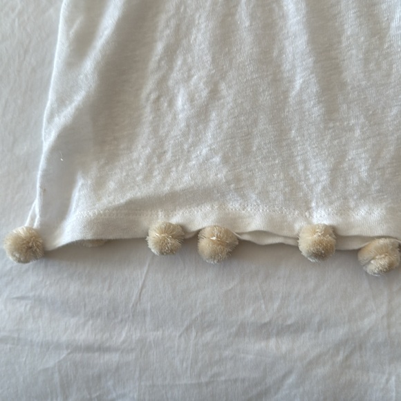 Darling white linen tank top with cream colored fuzzy balls attached to the hem - Picture 5 of 6